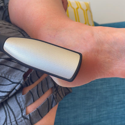 Person using Sole Saver on cracked heels